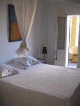 A pretty, white bed